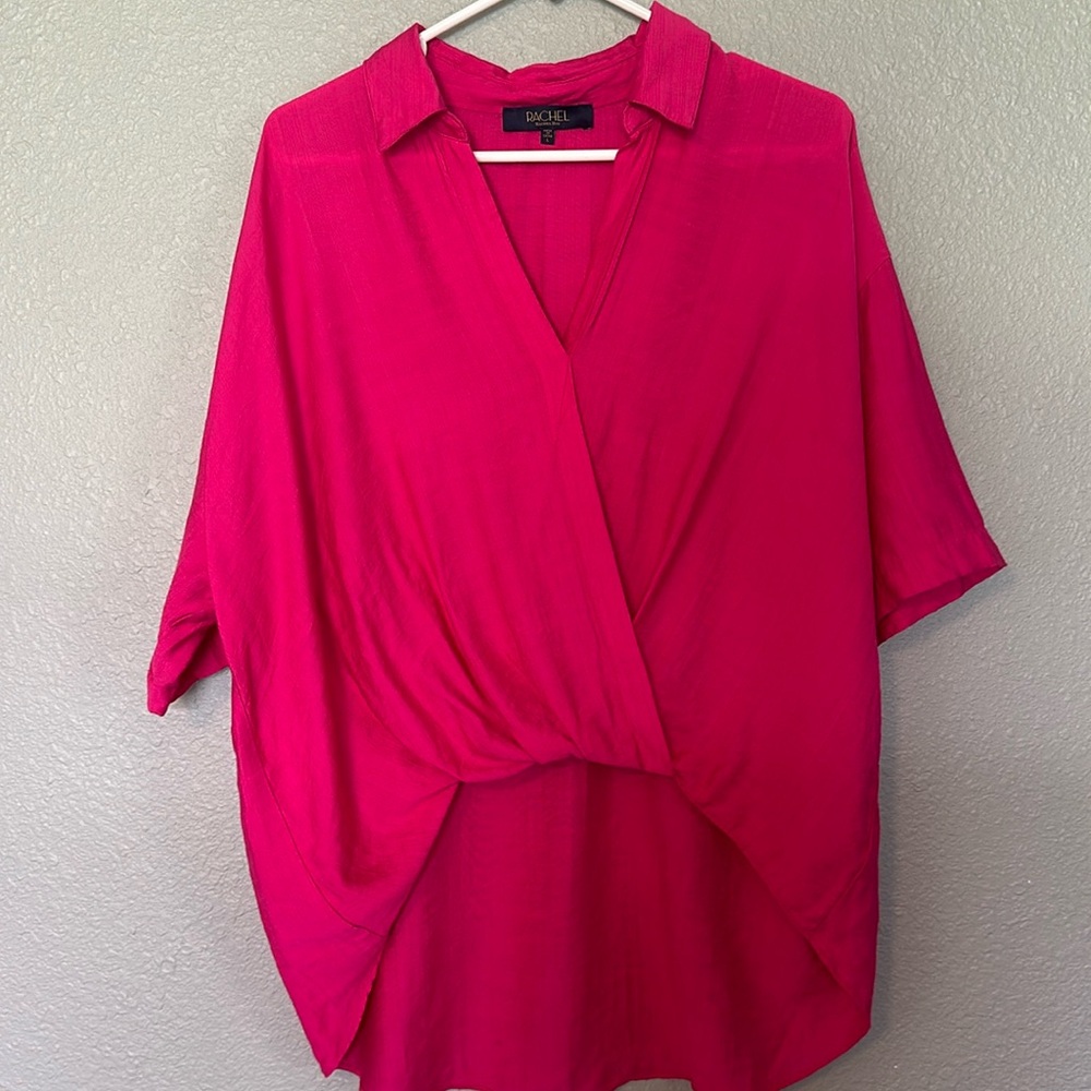 Bright pink Rachel Roy high low wrap top!